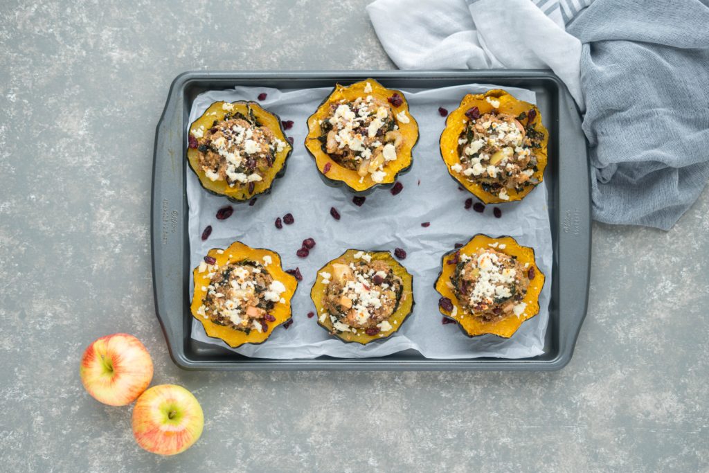 Overhead view of quinoa stuffed acorn squash