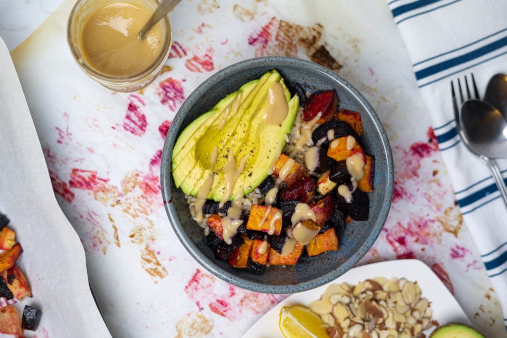 roasted root vegetable bowl with avocado
