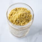 sunflower seed parmesan in a jar