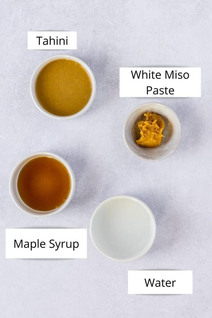 The ingredients for maple miso tahini in small bowls.