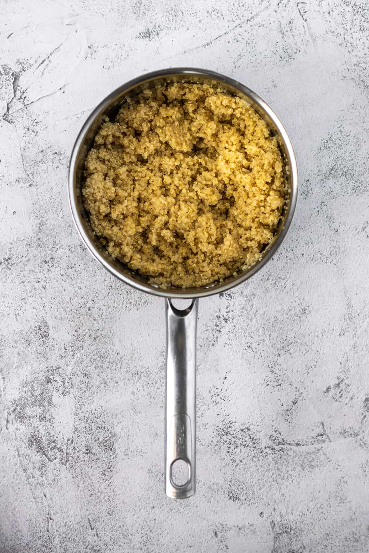 Cooked quinoa in a medium saucepan.