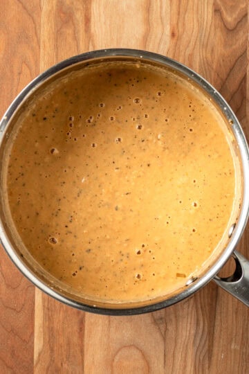 Blended cauliflower pasta sauce in a sauce pan.