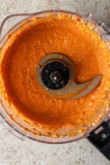Food processor of red pepper feta dip.