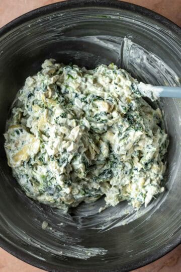 Greek yogurt mixed with spinach and artichoke.
