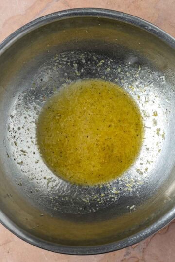 Lemon dijon dressing in a bowl.