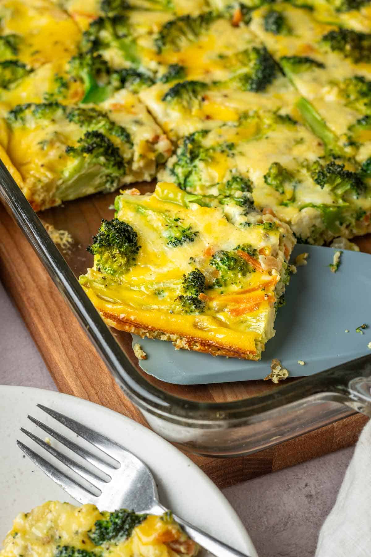 A slice of broccoli cheese egg bake.
