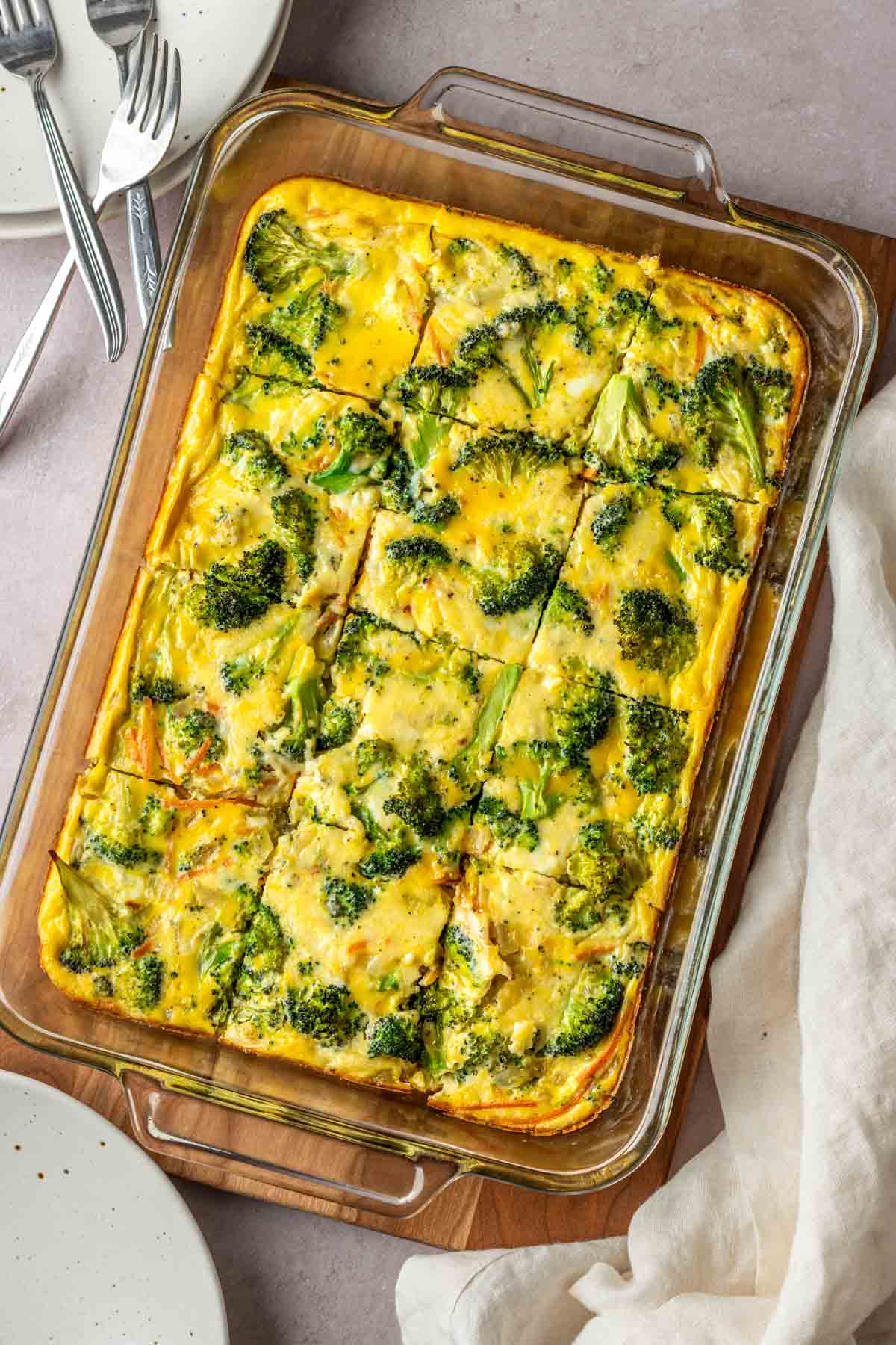 Broccoli and cheese egg bake in a baking dish.